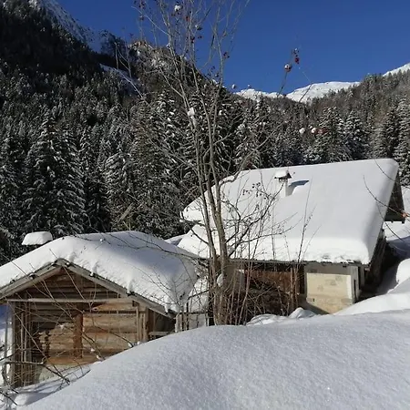 - Tra Pinzolo E *
